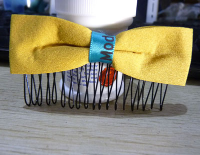 布艺蝴蝶结甜美发梳混批