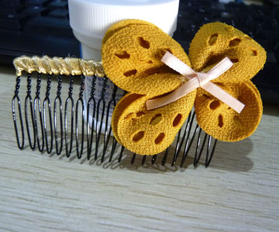 布艺蝴蝶结甜美发梳混批